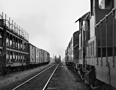 Much to the detest of train no. 75's crew, Seaboard Air Line Railroad Hamlet dispatcher required their train be broken into separate sections so as to fit into relatively short siding at New Hill, North Carolina. After a considerable wait, northbound manifest train no. 88 lumbers past on October 21, 1961. Photograph by J. Parker Lamb, © 2016, Center for Railroad Photography and Art. Lamb-01-080-09