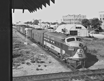 Missouri-Kansas-Texas Railroad northbound local freight train, led by a leased Wabash locomotive, crossing Frisco tracks at Vinita, Oklahoma, in the summer of 1959. Photograph by J. Parker Lamb, © 2015, Center for Railroad Photography and Art. Lamb-01-037-12