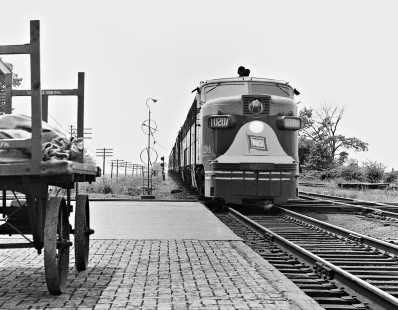 Wabash Railroad eastbound <i>Cannonball</i> passenger train led by PA diesel locomotive no. 1020A crossing the Illinois Central main line before halting at Tolono, Illinois, on March 29, 1958. Photograph by J. Parker Lamb, © 2015, Center for Railroad Photography and Art. Lamb-01-036-11