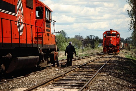 Northbound and southbound Ann Arbor Railroad freight trains meet in Clare, Michigan, on May 14, 1984. Photograph by John F. Bjorklund, © 2015, Center for Railroad Photography and Art. Bjorklund-03-09-19