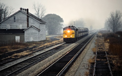 Eastbound VIA Rail passenger train on the Canadian National Railway in Jeannettes Creek, Ontario, on November 29, 1986. Photograph by John F. Bjorklund, © 2015, Center for Railroad Photography and Art. Bjorklund-22-15-08
