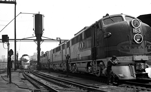 Streamlined Santa Fe passenger power at the locomotive service racks at Chicago's 18th Street roundhouse on June 22, 1946. FT diesel-electric no. 163 is at right, with 4-6-4 steam locomotive no. 3460 in the distance. Photograph by Wallace W. Abbey, © 2015, Center for Railroad Photography and Art. Abbey-01-051-03