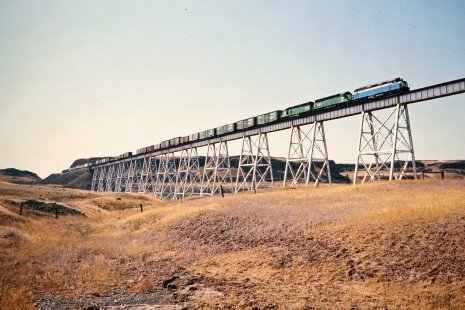 Burlington Northern Railroad freight train on Cow Creek Trestle Bridge near Benge, Washington, on July 17, 1973. Photograph by John F. Bjorklund, © 2015, Center for Railroad Photography and Art. Bjorklund-08-01-05