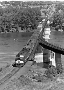 Soo Line westbound freight train no. 125 crossing the Mississippi River as seen from the Camden elevator in Minneapolis, Minnesota, in July 1962. Photograph by Wallace W. Abbey, © 2015, Center for Railroad Photography and Art. Abbey-05-064-13