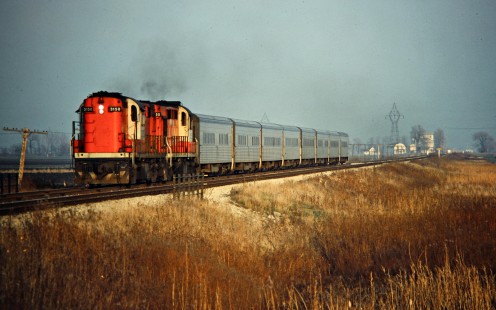 Westbound Canadian National Railway passenger train at Prairie Siding, Ontario, on November 28, 1975. Photograph by John F. Bjorklund, © 2015, Center for Railroad Photography and Art. Bjorklund-20-10-02