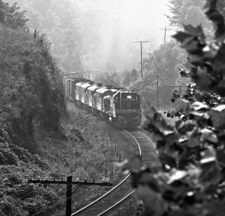 Westbound Southern Railway train leaves Old Fort, North Carolina, en route to Asheville, NC, in October 1974. Photograph by J. Parker Lamb, © 2016, Center for Railroad Photography and Art. Lamb-01-086-01