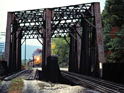 Southbound Baltimore and Ohio Railroad freight train approach a bridge in Salamanca, New York, on October 3, 1981. Photograph by John F. Bjorklund, © 2015, Center for Railroad Photography and Art. Bjorklund-16-22-17