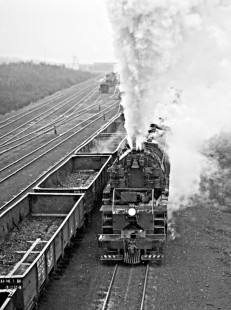 Duluth, Missabe and Iron Range Railway steam locomotive no. 229 and freight train leaves yard at Proctor, Minnesota, on April 24, 1960. Photograph by J. Parker Lamb, © 2015, Center for Railroad Photography and Art. 1960-04-24