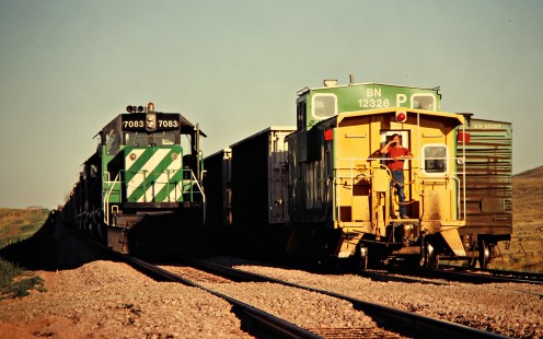 Eastbound and westbound Burlington Northern Railroad freight trains in Upton, Wyoming, on July 15, 1980. Photograph by John F. Bjorklund, © 2015, Center for Railroad Photography and Art. Bjorklund-11-25-06