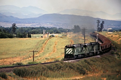 Southbound Burlington Northern Railroad ore train in Sedallia, Colorado, in July, 1978. Photograph by John F. Bjorklund, © 2015, Center for Railroad Photography and Art. Bjorklund-10-02-03