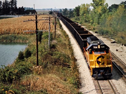 Eastbound Baltimore and Ohio Railroad freight train in Defiance, Ohio, on September 11, 1982. Photograph by John F. Bjorklund, © 2015, Center for Railroad Photography and Art. Bjorklund-16-25-20