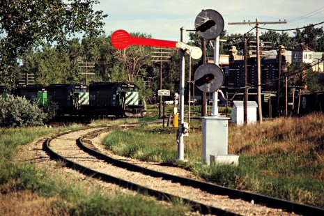 Eastbound Burlington Northern Railroad freight train on the Soo Line track in Bismarck, North Dakota, on July 7, 1980. Photograph by John F. Bjorklund, © 2015, Center for Railroad Photography and Art. Bjorklund-11-06-14