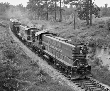 Northbound Norfolk Southern Railway freight train no. 64, led by Baldwin units, rolls through a cut east of Raleigh, North Carolina, in June 1960. Photograph by J. Parker Lamb, © 2016, Center for Railroad Photography and Art. Lamb-01-086-08
