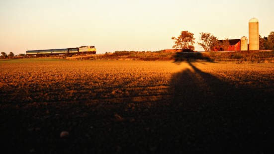 VIA Rail passenger train on the Canadian National Railway in Glencoe, Ontario, on October 1, 1989. Photograph by John F. Bjorklund, © 2015, Center for Railroad Photography and Art. Bjorklund-22-29-09