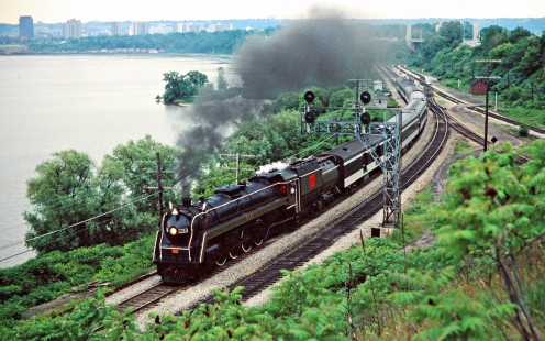 Westbound Canadian National Railway passenger excursion train with steam locomotive no. 6060 in Hamilton, Ontario, on June 6, 1977. Photograph by John F. Bjorklund, © 2015, Center for Railroad Photography and Art. Bjorklund-20-15-01