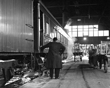Preparations for the last run of Soo Line passenger train no. 8, about to depart Minneapolis, Minnesota, for Sault Ste. Marie, Michigan, on March 4, 1960. Photograph by Wallace W. Abbey, © 2015, Center for Railroad Photography and Art. Abbey-04-130-06