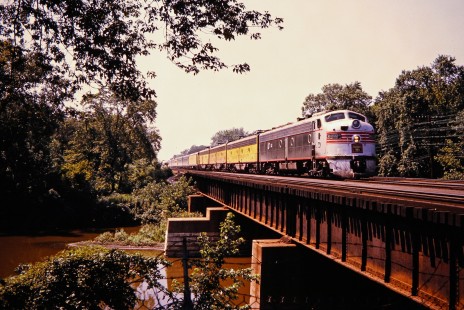Amtrak passenger train no. 6 with led by a Burlington E-unit over Des Plaines River in Riverside, Illinois, on August 18, 1972. Photograph by John F. Bjorklund, © 2015, Center for Railroad Photography and Art. Bjorklund-07-19-13