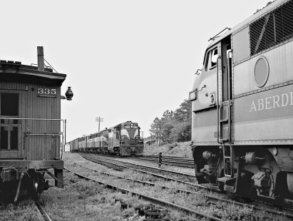 Southbound Seaboard Air Line Railroad train no. 75 passes Aberdeen and Rockfish Railroad F3 at Aberdeen, North Carolina, in June 1962. Photograph by J. Parker Lamb, © 2016, Center for Railroad Photography and Art. Lamb-01-071-10