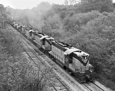 Northbound Chicago and North Western train from St. Louis grinds up Radnor Hill, Illinois, (near Peoria) on October 3, 1960. Photograph by J. Parker Lamb, © 2015, Center for Railroad Photography and Art. Lamb-01-058-05