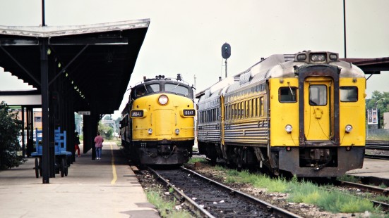 Westbound VIA Rail passenger train meeting RDCs on the Canadian National Railway in London, Ontario, on August 1, 1987. Photograph by John F. Bjorklund, © 2015, Center for Railroad Photography and Art. Bjorklund-22-22-03