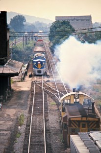 Eastbound Delaware and Hudson Railway freight train in Binghamton, New York, on July 23, 1975. Photograph by John F. Bjorklund, © 2015, Center for Railroad Photography and Art. Bjorklund-18-20-25