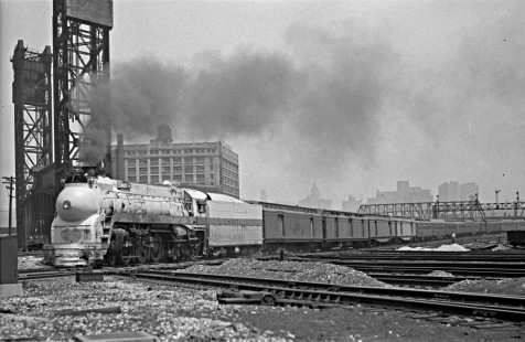 Santa Fe passenger train no. 23, the westbound <i>Grand Canyon</i> led by streamlined 4-6-4 steam locomotive no. 3460, crossing the Pennsylvania and the Chicago & Western Indiana railroads at 21st Street on its way out of Chicago on June 22, 1946. Photograph by Wallace W. Abbey, © 2015, Center for Railroad Photography and Art. Abbey-01-052-02