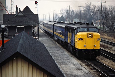 Westbound VIA Rail passenger train on the Canadian National Railway in Glencoe, Ontario, on November 29, 1986. Photograph by John F. Bjorklund, © 2015, Center for Railroad Photography and Art. Bjorklund-22-15-16