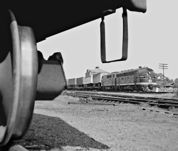 Southbound Atlantic Coast Line Railroad TOFC (trailer-on-flatcar) freight train departs from yard at Rocky Mount, North Carolina, in May 1962. Photograph by J. Parker Lamb, © 2016, Center for Railroad Photography and Art. Lamb-01-092-08