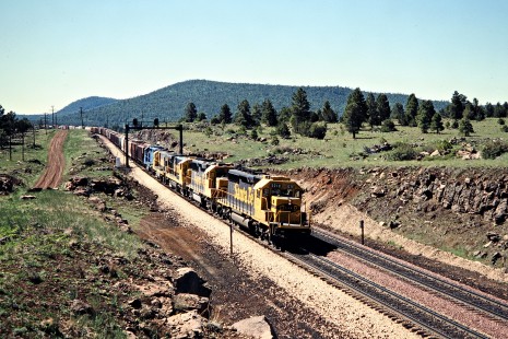 Santa Fe Railway freight train in East Perrin, Arizona, on June 5, 1990. Photograph by John F. Bjorklund, © 2015, Center for Railroad Photography and Art. Bjorklund-05-25-18