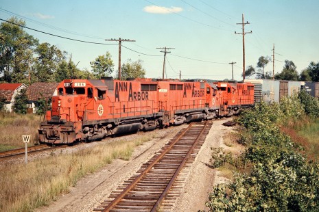 Northbound Ann Arbor Railroad at Grand Trunk Western Railroad crossing in Lakeland, Michigan, on August 31, 1974. Photograph by John F. Bjorklund, © 2015, Center for Railroad Photography and Art. Bjorklund-03-15-03
