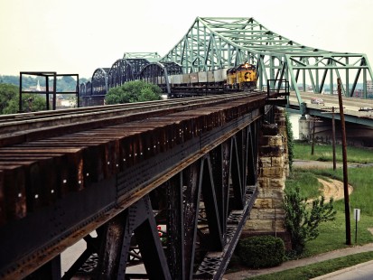 Westbound Baltimore and Ohio Railroad freight train on the Ohio River bridge in Belpre, Ohio, on May 20, 1984. Photograph by John F. Bjorklund, © 2015, Center for Railroad Photography and Art. Bjorklund-17-01-18