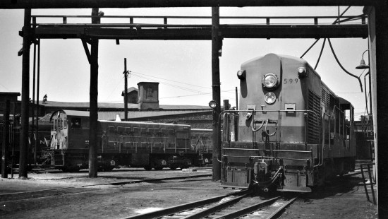 New York, New Haven and Hartford train with FM H-44 switcher no. 599 and Alco S-2 at Dover Street, at Charles Street Roundhouse in Providence, Rhode Island,  some time between 1950 and 1955. Photograph by Leo King, © 2016, Center for Railroad Photography and Art. King-01-008-001