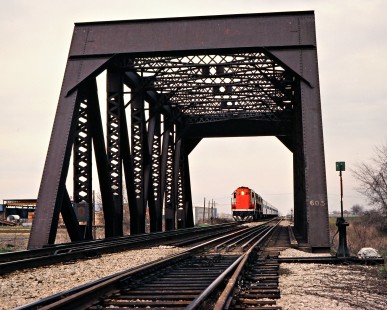 Westbound Canadian National Railway passenger train with RS18 no. 3150 in Chatham, Ontario, on April 29, 1979. Photograph by John F. Bjorklund, © 2015, Center for Railroad Photography and Art. Bjorklund-20-18-09