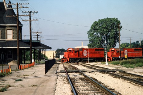Southbound Ann Arbor Railroad freight train at Grand Trunk Western Railroad crossing in Durand, Michigan, on August 14, 1982. Photograph by John F. Bjorklund, © 2015, Center for Railroad Photography and Art. Bjorklund-03-29-06