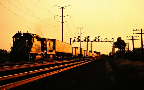 Eastbound Burlington Northern Railroad freight train in Naperville, Illinois, on August 10, 1991. Photograph by John F. Bjorklund, © 2015, Center for Railroad Photography and Art. Bjorklund-14-13-21
