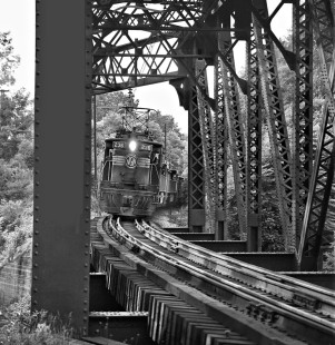 The last electrified run into Roanoke on the ex-Virginian Railway line crosses over the Norfolk and Western Railway at Singer, Virginia, on June 29, 1962. Photograph by J. Parker Lamb, © 2016, Center for Railroad Photography and Art. Lamb-01-091-04