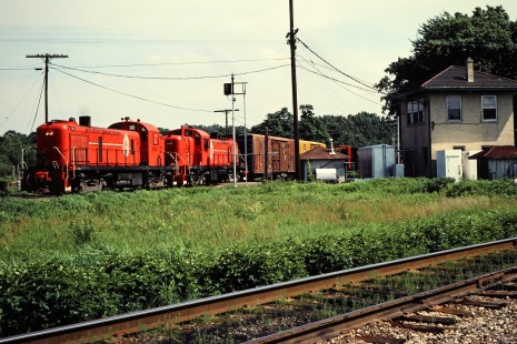 Northbound Ann Arbor Railroad freight train at Diann Tower and Detroit, Toledo and Ironton Railroad crossing in Dundee, Michigan, on June 21, 1981. Photograph by John F. Bjorklund, © 2015, Center for Railroad Photography and Art. Bjorklund-03-26-04