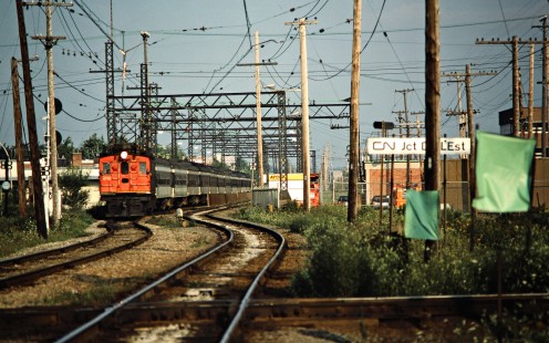 Eastbound Canadian National Railway passenger train led by electric no. 6715 in Montreal, Quebec, on August 18, 1986. Photograph by John F. Bjorklund, © 2015, Center for Railroad Photography and Art. Bjorklund-22-03-04