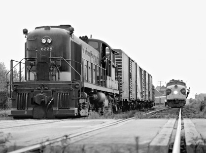 Southern Railway's executive train has come from Roanoke, Virginia, to Selma, North Carolina, on Atlantic Coast Line Railroad track. Here the extra has wyed onto Southern Railway rails for westward trip to Greensboro, NC, as an eastbound local freight train stands in the clear in June 1961. Photograph by J. Parker Lamb, © 2016, Center for Railroad Photography and Art. Lamb-01-082-01