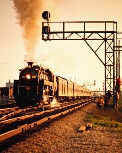 Eastbound Canadian National Railway passenger excursion train with steam locomotive no. 6060 in Burlington, Ontario, on May 27, 1974. Photograph by John F. Bjorklund, © 2015, Center for Railroad Photography and Art. Bjorklund-19-27-21