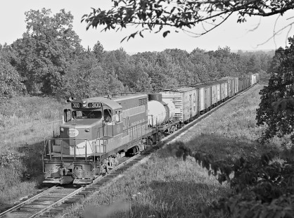 Aberdeen and Rockfish Railroad GP18 locomotive no. 300 (replacement for F3) heads eastward in North Carolina on early morning in July 1962. Photograph by J. Parker Lamb, © 2016, Center for Railroad Photography and Art. Lamb-01-094-11