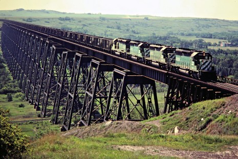 Eastbound Burlington Northern Railroad coal train on Hi-Line Bridge in Valley City, North Dakota, on July 4, 1980. Photograph by John F. Bjorklund, © 2015, Center for Railroad Photography and Art. Bjorklund-11-02-14