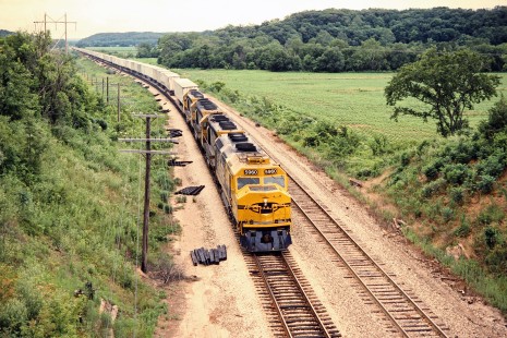 Eastbound Santa Fe Railway freight train in Wilburn, Illinois, on July 13, 1990. Photograph by John F. Bjorklund, © 2015, Center for Railroad Photography and Art. Bjorklund-05-27-17