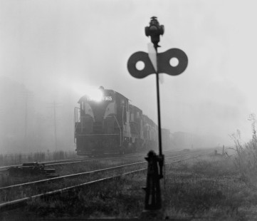 Seaboard Air Line Railroad freight train no. 280 departs the yard at Raleigh, North Carolina, with dense fog in December 1961. Photograph by J. Parker Lamb, © 2016, Center for Railroad Photography and Art. Lamb-01-068-08
