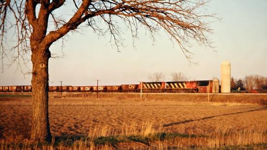 Westbound Canadian National Railway freight train through Glenco, Ontario, on April 19, 1974. Photograph by John F. Bjorklund, © 2015, Center for Railroad Photography and Art. Bjorklund-19-23-01