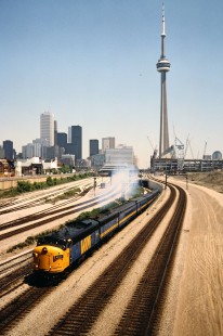 Westbound VIA Rail passenger train on the Canadian National Railway in Toronto, Ontario, on May 27, 1988. Photograph by John F. Bjorklund, © 2015, Center for Railroad Photography and Art. Bjorklund-22-24-07