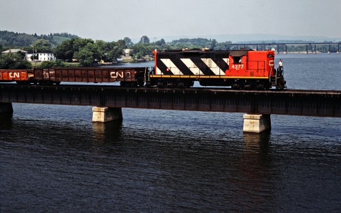 Eastbound Canadian National Railway freight train crossing the Trent River in Trenton, Ontario, on July 5, 1985. Photograph by John F. Bjorklund, © 2015, Center for Railroad Photography and Art. Bjorklund-21-24-25