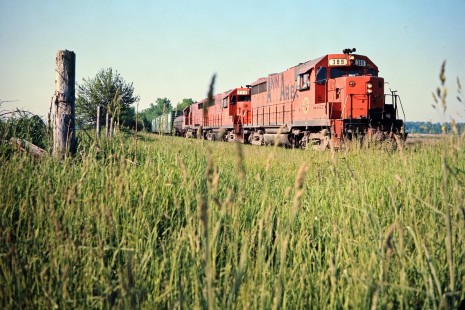 Northbound Ann Arbor Railroad freight train in Rosebush, Michigan, on June 5, 1976. Photograph by John F. Bjorklund, © 2015, Center for Railroad Photography and Art. Bjorklund-01-12-05