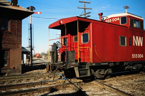 Southbound Ann Arbor Railroad freight train meeting Eastbound Norfolk and Western Railway caboose in Milan, Michigan, on December 17, 1978. Photograph by John F. Bjorklund, © 2015, Center for Railroad Photography and Art. Bjorklund-01-28-09