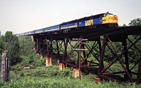 Eastbound VIA Rail passenger train on the Canadian National Railway in Dorchester, Ontario, on June 11, 1983. Photograph by John F. Bjorklund, © 2015, Center for Railroad Photography and Art. Bjorklund-21-16-25